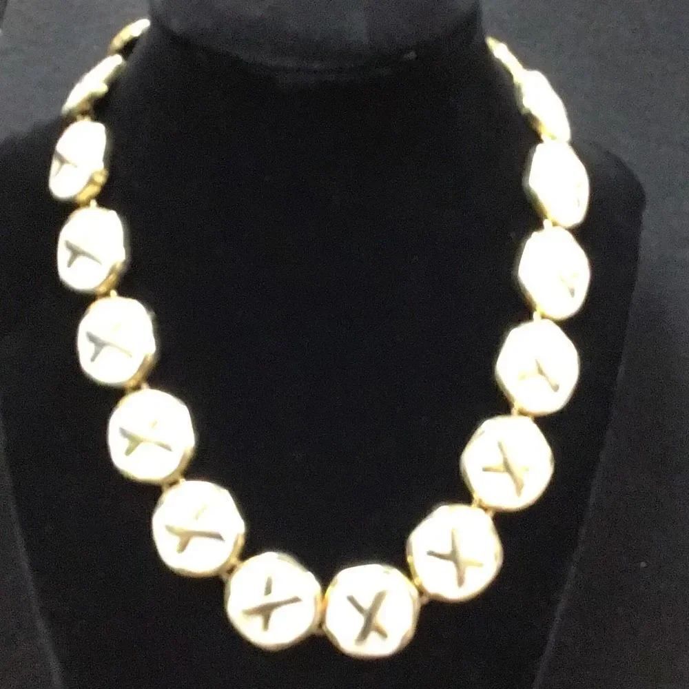 Necklace, beautiful, gold, and cream x’s & o’s Unknown maker from estate sale